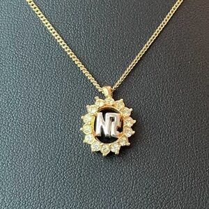 Nina Ricci Round Pendant Necklace